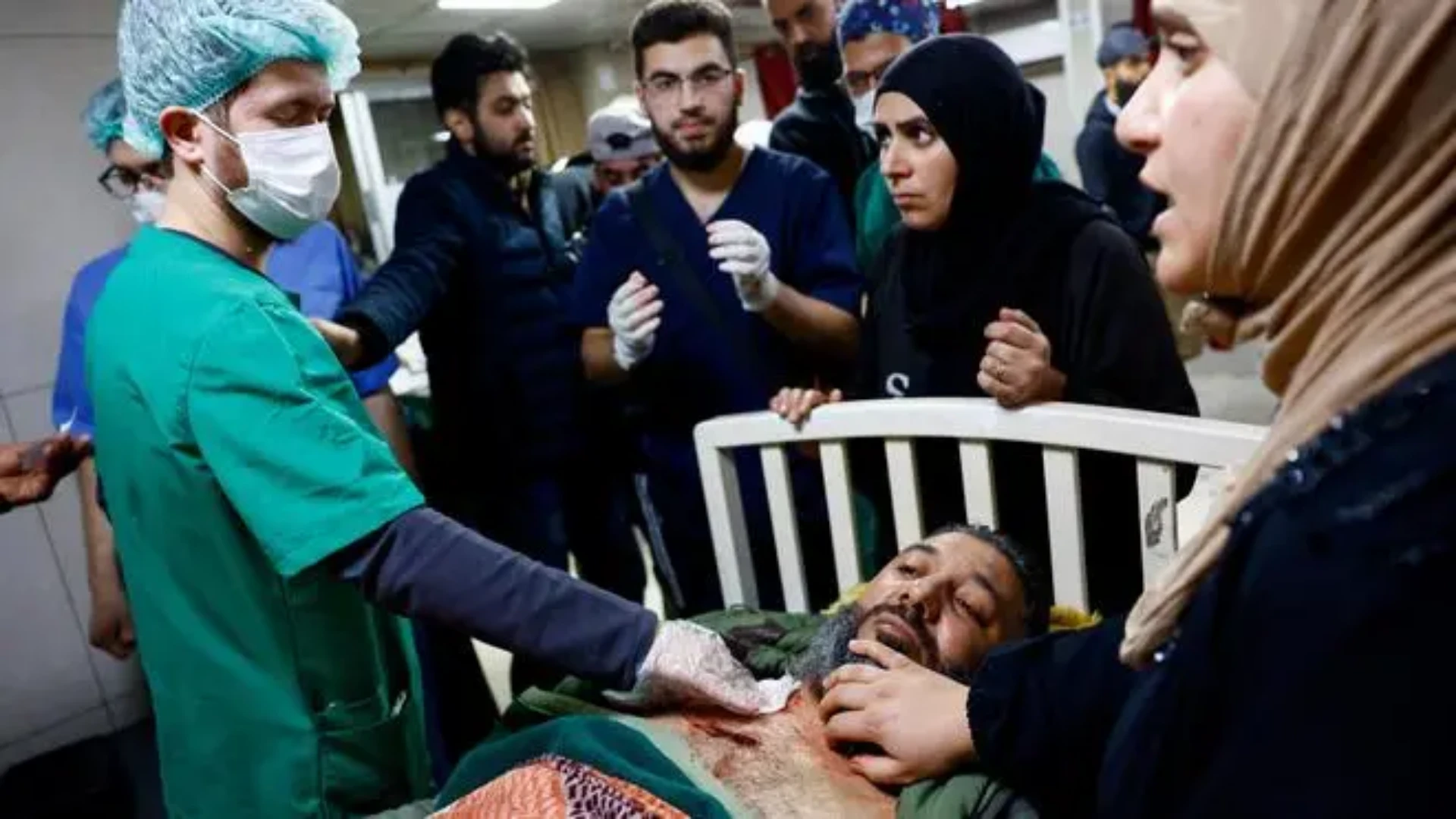 A wounded man receives emergency treatment at a hospital in Damascus after an Israeli raid in the Beit Jinn area of southern Syria on November 28.
