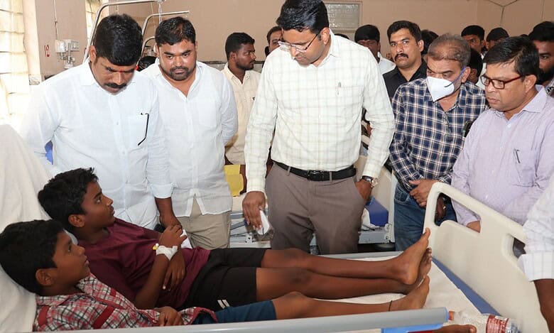 Gadwal collector BM Santhosh visited the students of BC boys hostel after the food poisoning incident.