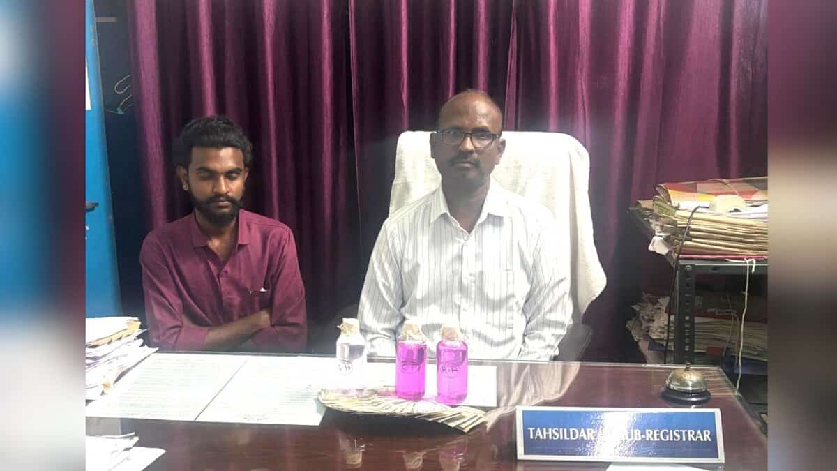 Image shows a government official nabbed by Telangana ACB for accepting a bribe