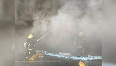 Firefighters tackle heavy smoke while extinguishing a shop fire in Dammam’s Al-Souq district.