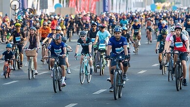 Cyclists ride along Sheikh Zayed Road during Dubai’s 30x30 fitness challenge