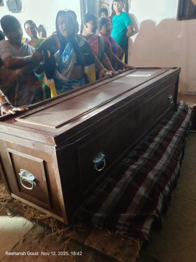 Family mourns beside the coffin of Telangana worker Koyyada Yellaiah after body arrival from Saudi Arabia.