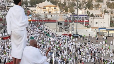 Haj pilgrims gather and pray on Mount Arafat during the annual pilgrimage in Saudi Arabia.