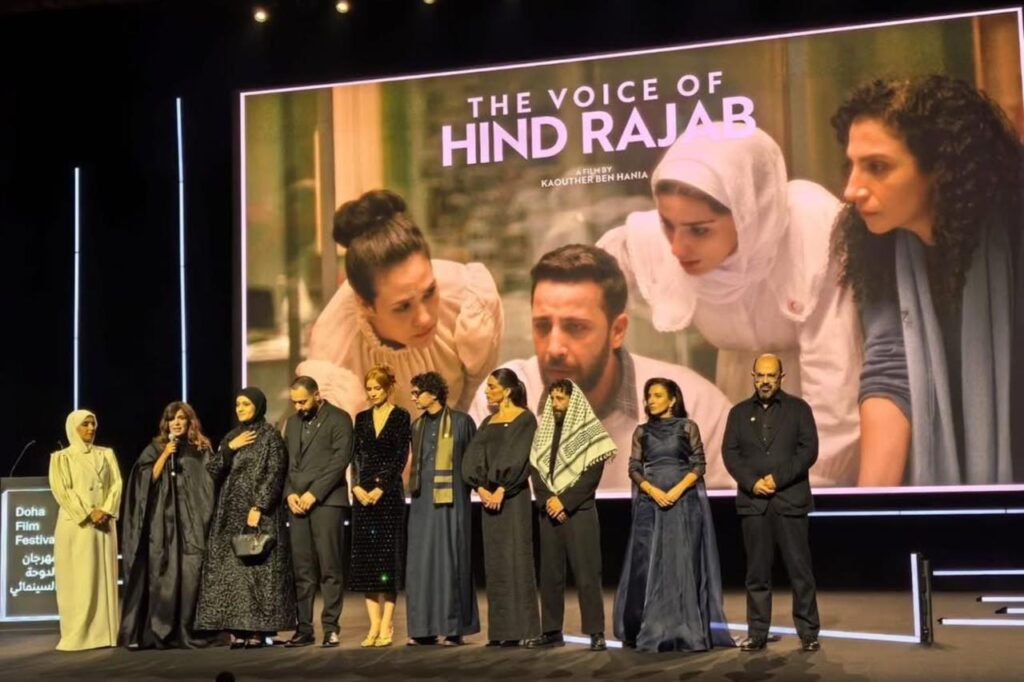Hind Rajab’s mother and the film team stand on stage at the DFF25 premiere.