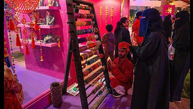 Visitors explore a colourful Indian bangle stall at the ‘Mini India’ bazaar during India Week at Riyadh Season.
