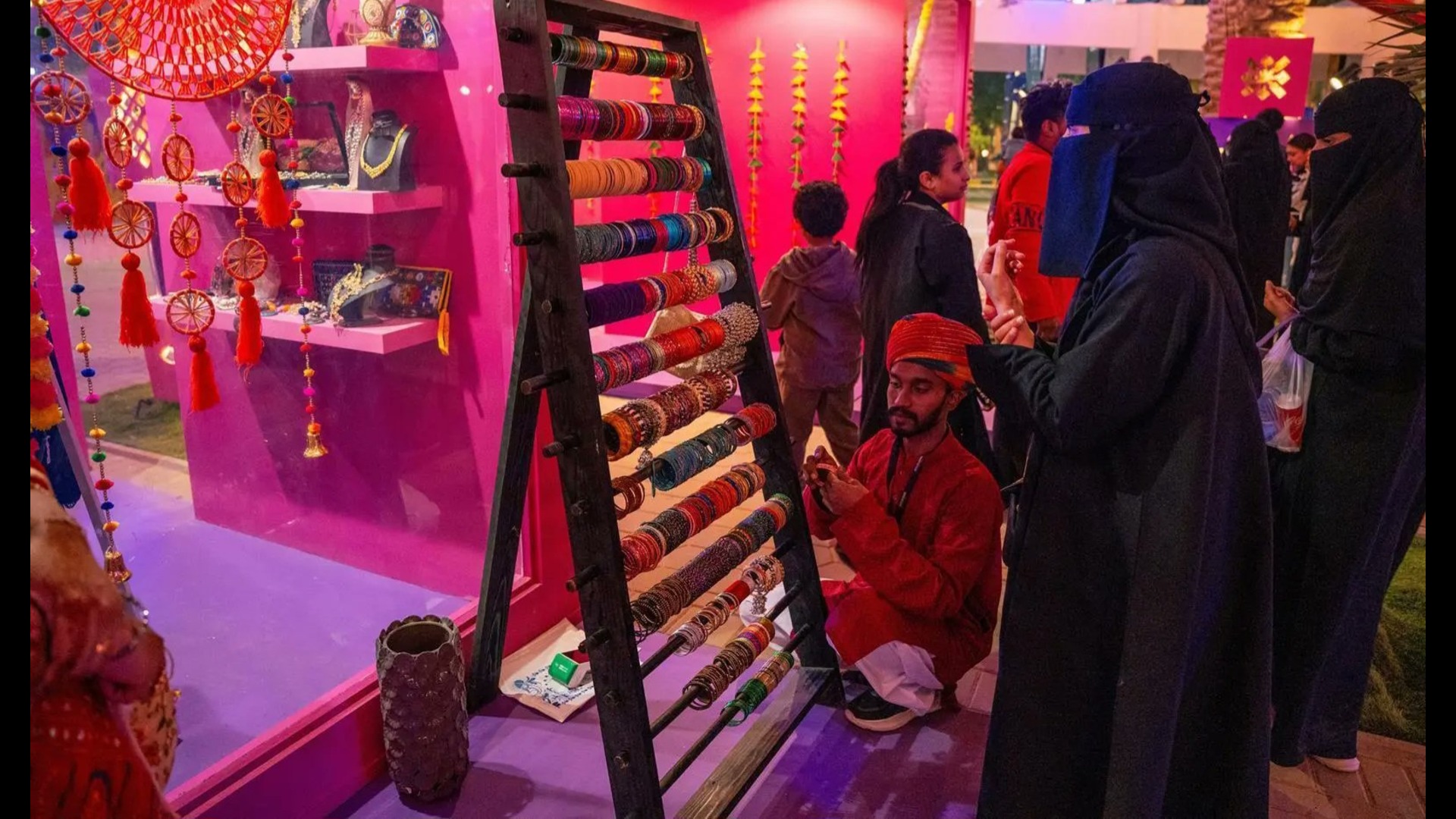 Visitors explore a colourful Indian bangle stall at the ‘Mini India’ bazaar during India Week at Riyadh Season.