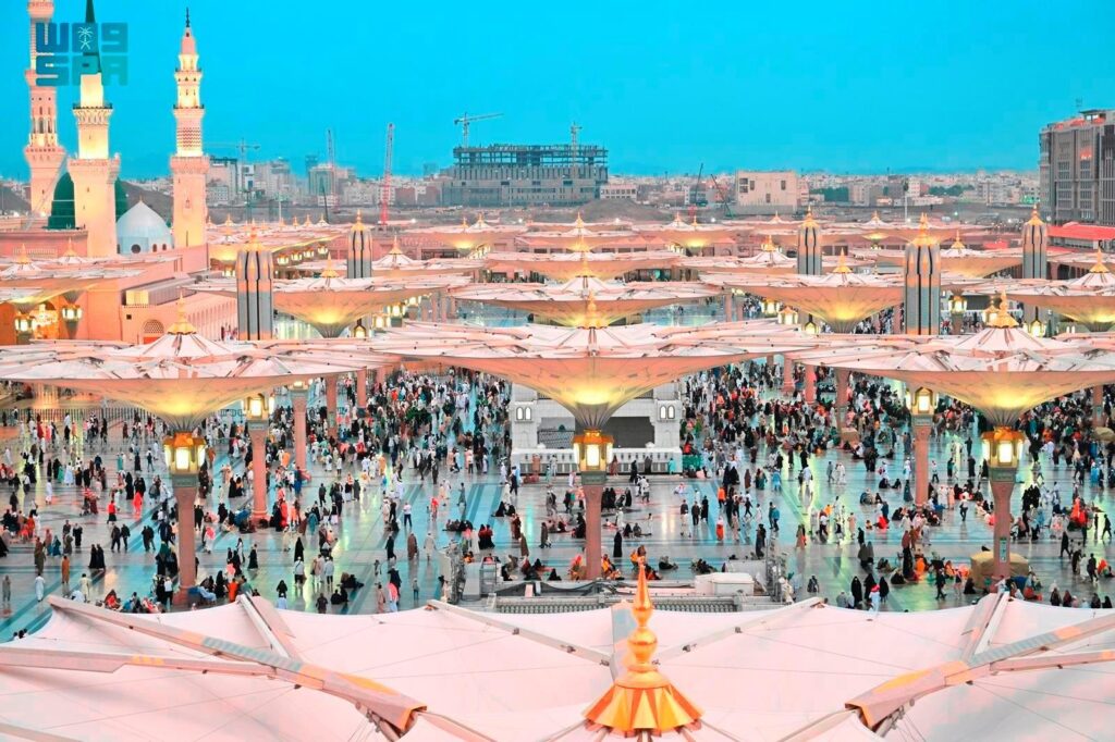 Cultural and religious gathering at Masjid al-Haram with worshippers.