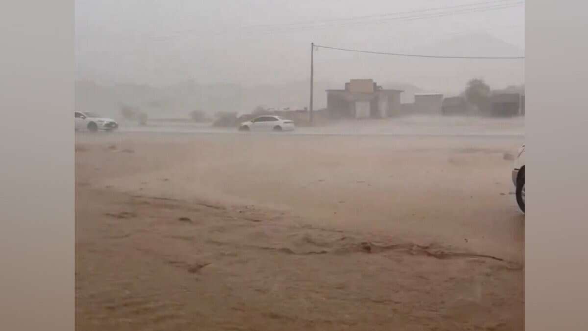 Cars drive through heavy rain and flooding in the Makkah region, Saudi Arabia.