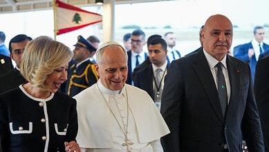 Religious leader arriving in Beirut, greeted by officials.