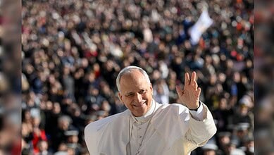 Pope Leo XIV greets pilgrims during a public audience.