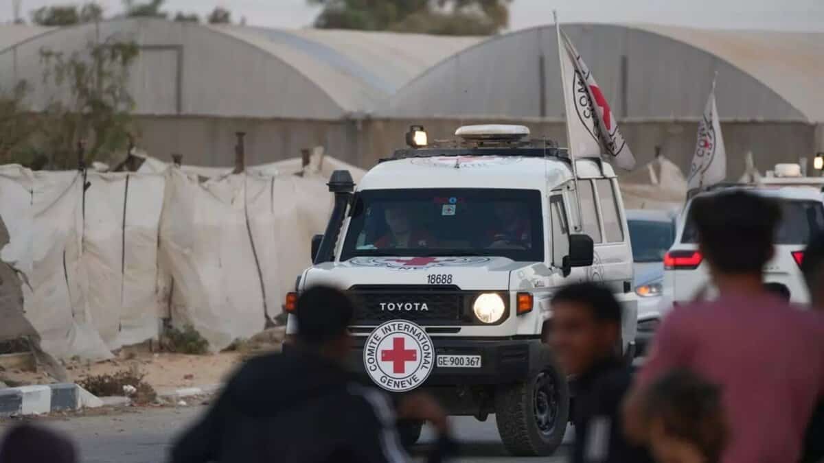 A Red Cross vehicle drives through Gaza carrying remains for transfer to Israel amid the ongoing ceasefire.