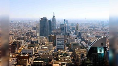 Aerial view of central Riyadh’s modern skyline and business district.