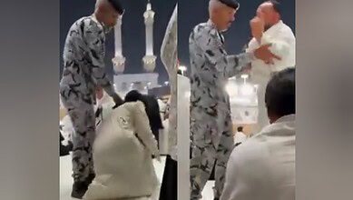 A security officer at Makkah’s Grand Mosque seen pulling a woman sitting near the Holy Kaaba and confronting a male pilgrim during a heated moment.