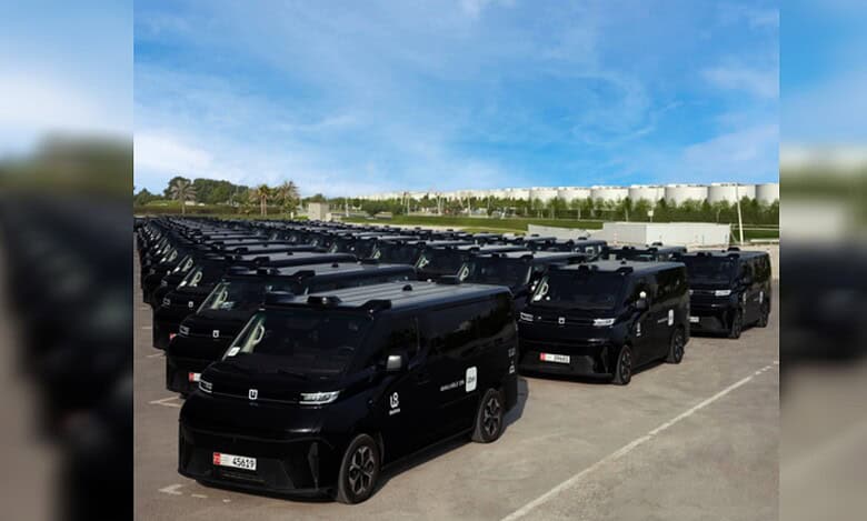 A fleet of WeRide driverless Robotaxi vehicles lined up in Abu Dhabi.