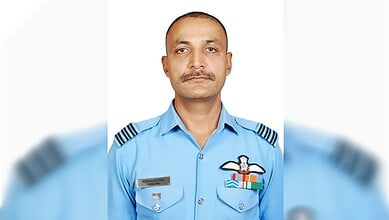 Portrait of IAF Wing Commander Namansh Syal in uniform.