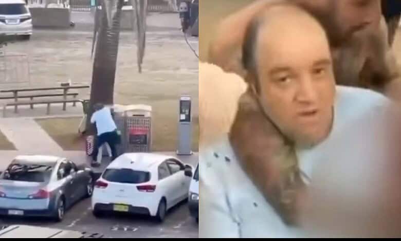 Ahmed Al Ahmed is helped by bystanders after chasing the shooter