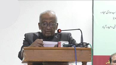 Old photo of Asif Pasha Ex-Law Minister delivering a speech