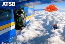 Australia skydiver's parachute stuck on plane