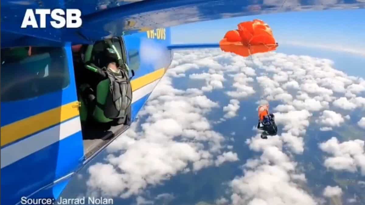 Australia skydiver's parachute stuck on plane