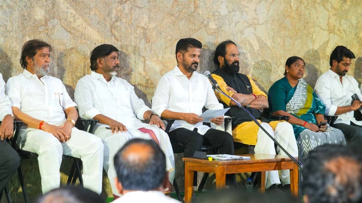 CM Revanth Reddy (center) flanked by deputy CM Mallu Bhatti Vikramarka (left) and state irrigation minister Uttam Kumar Reddy along with other ministers during a press conference in Hyderabad