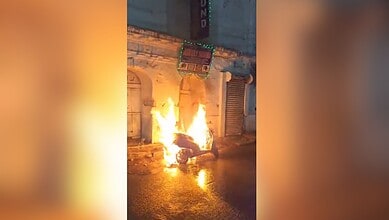 Image shows a burning scooter