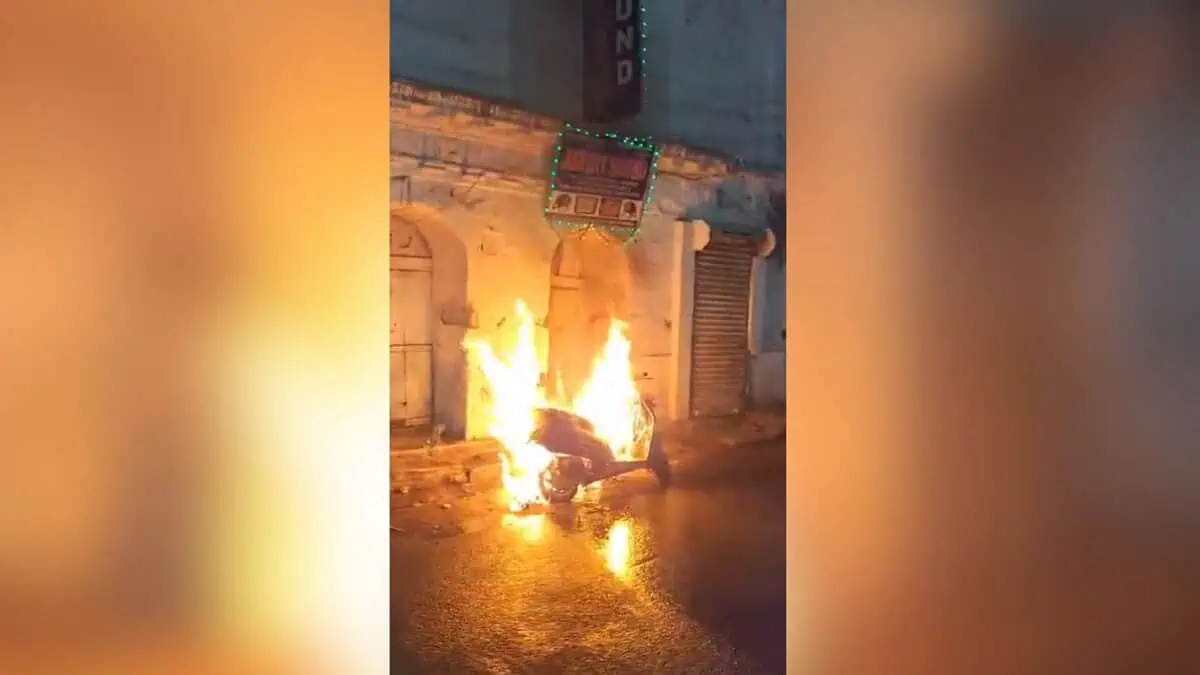 Image shows a burning scooter
