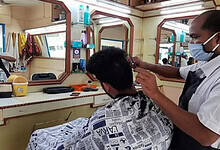 Man announces freee barber service for five years if wife wins elections