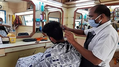 Man announces freee barber service for five years if wife wins elections