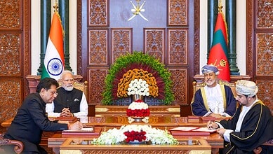 In this image received on Dec. 18, 2025, Prime Minister Narendra Modi with Sultan of Oman Haitham bin Tarik witnesses exchange of MoUs, in Muscat, Oman. Union Minister of Commerce and Industry Piyush Goyal is also seen. (PMO via PTI Photo)