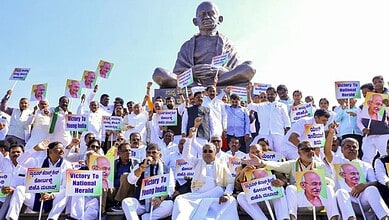 Karnataka Chief Minister Siddaramaiah with Deputy CM DK Shivakumar and other Congress leaders stage a protest against the Centre's move to replace the existing rural employment law MGNREGA in Belagavi on Wednesday. (PTI Photo)