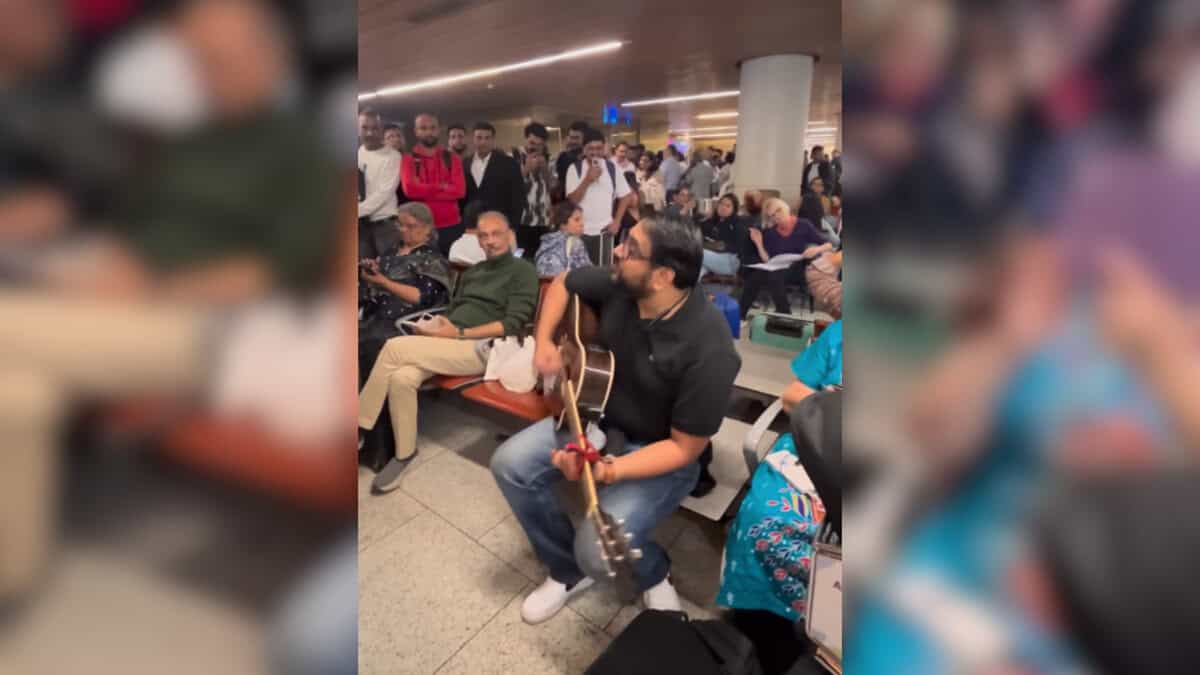 Mumbai man plays guitar after flights cancelled