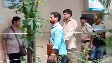 Railway Protection Force (RPF) jawan accused of shooting four persons dead on board the Mumbai-Jaipur Superfast Express train being brought to the Borivali Police Station (PTI Photo)