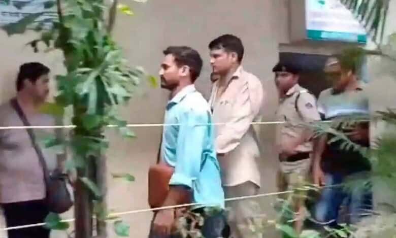 Railway Protection Force (RPF) jawan accused of shooting four persons dead on board the Mumbai-Jaipur Superfast Express train being brought to the Borivali Police Station (PTI Photo)