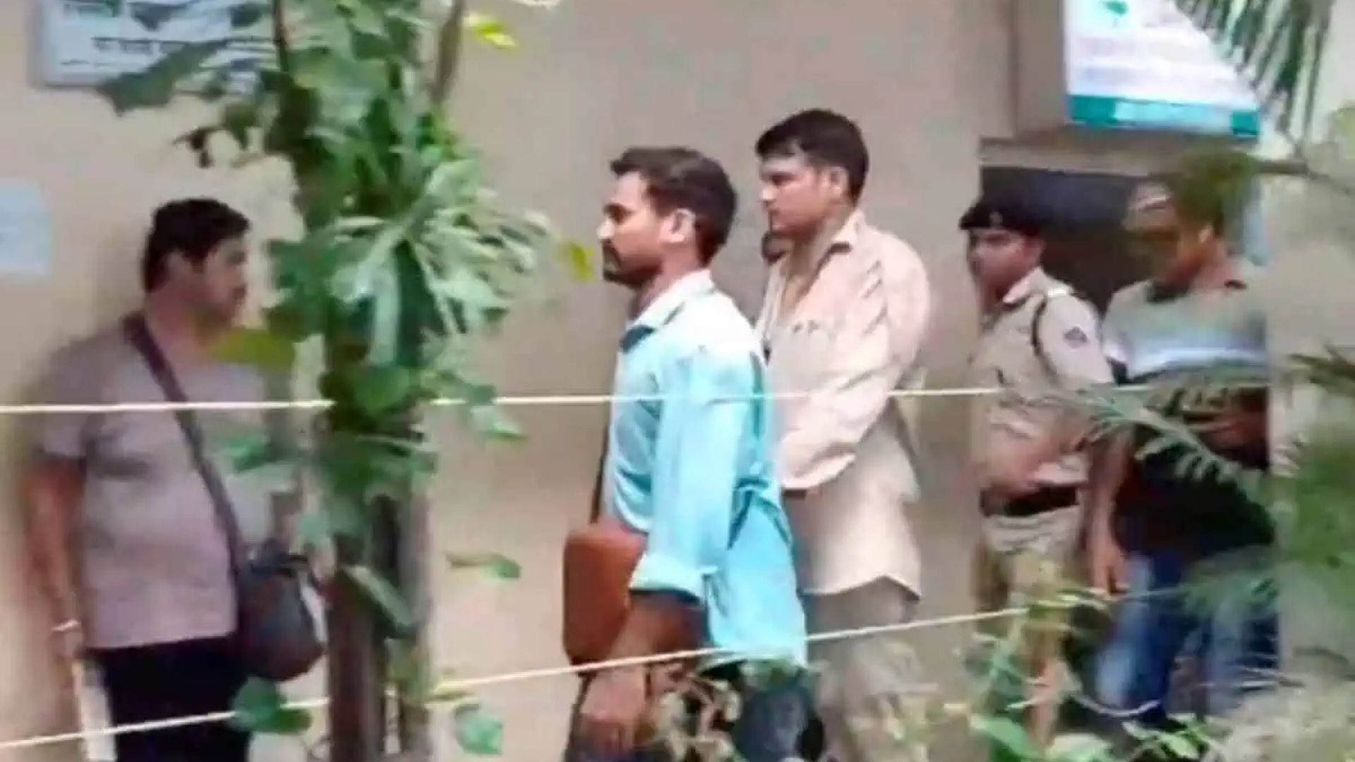 Railway Protection Force (RPF) jawan accused of shooting four persons dead on board the Mumbai-Jaipur Superfast Express train being brought to the Borivali Police Station (PTI Photo)