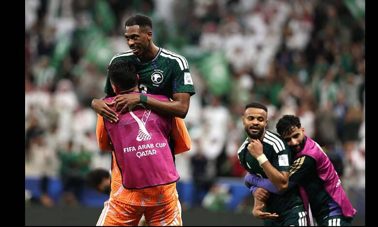 Suadi Arabia foot ballers celebrate their win over Palestine in FIFA Arab Cup