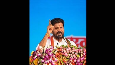 Telangana CM Revanth Reddy addresses a meeting in Warangal