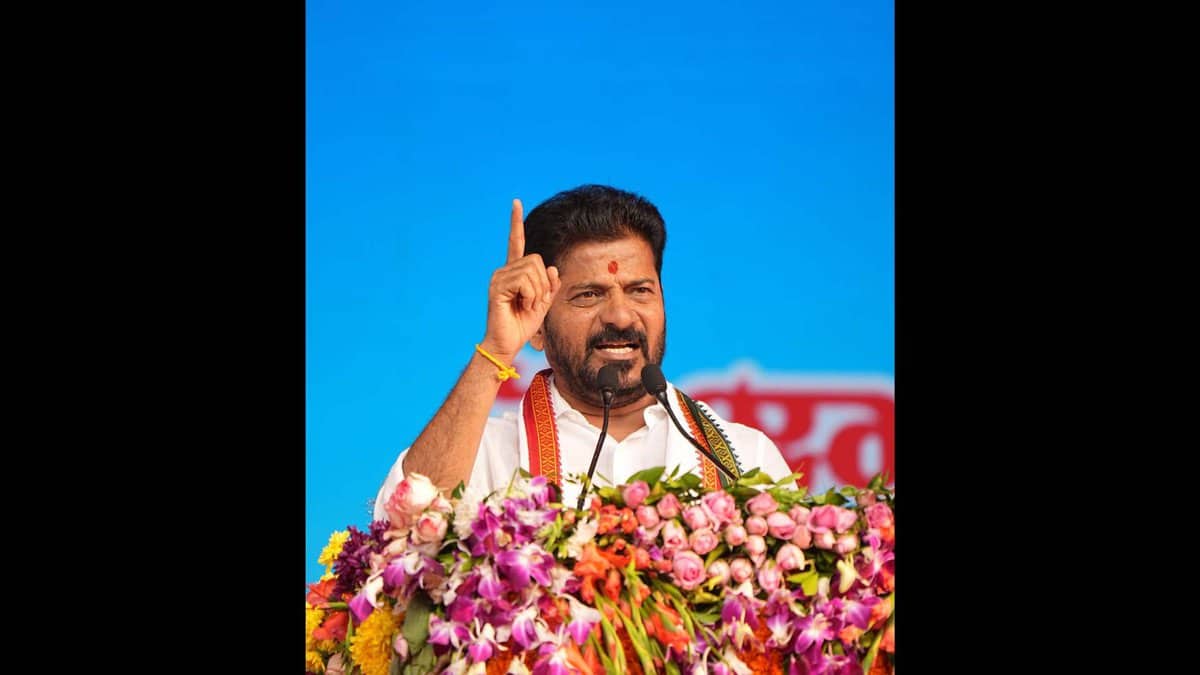 Telangana CM Revanth Reddy addresses a meeting in Warangal