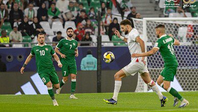 Palestinian and Syrian players compete in the Arab Cup match