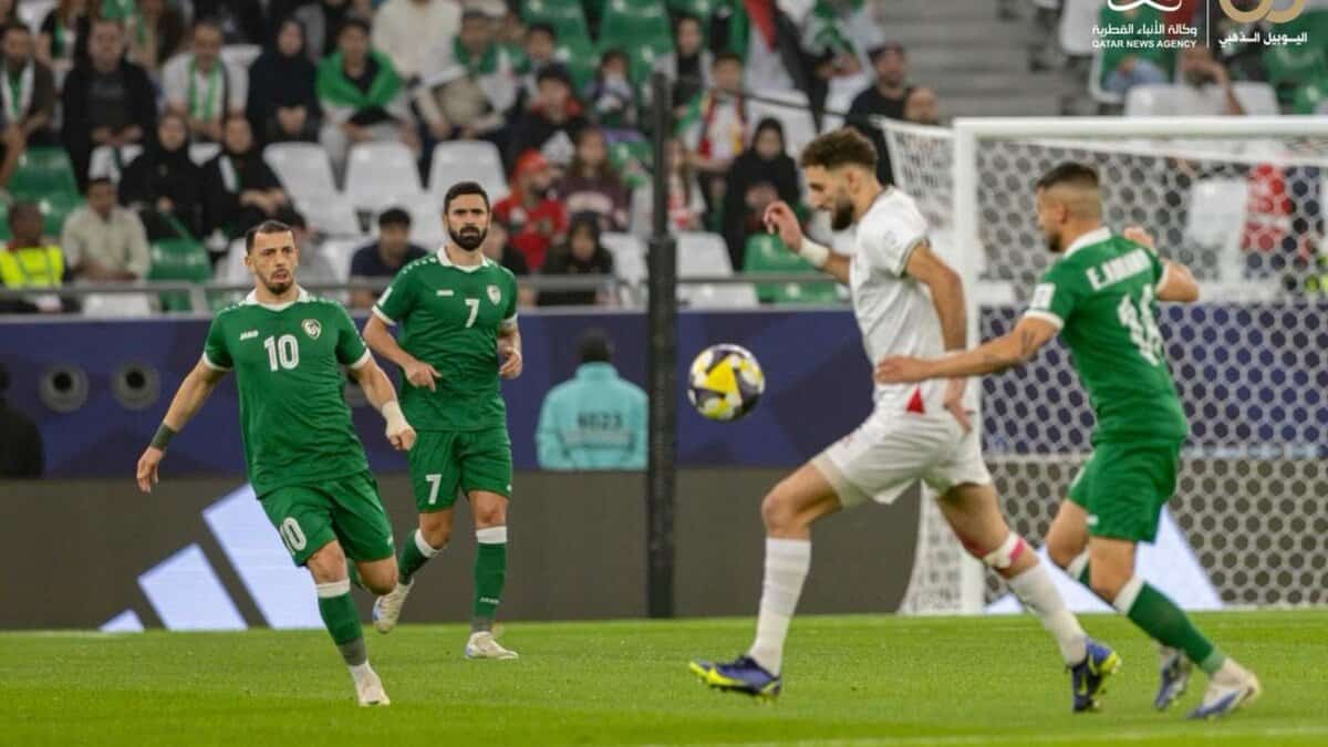Palestinian and Syrian players compete in the Arab Cup match