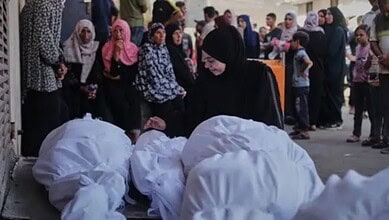 A Palestinian woman mourns the death