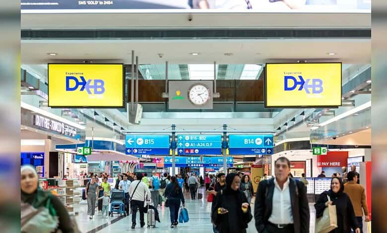 Passengers move through Dubai International Airport (DXB) terminal