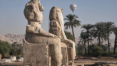 Two giant alabaster statutes for Pharoah Amenhotep III, before the official opening, in the southern city of Luxor, Egypt, Sunday, December 14. (Image: Associated Press/Amr Nabil)