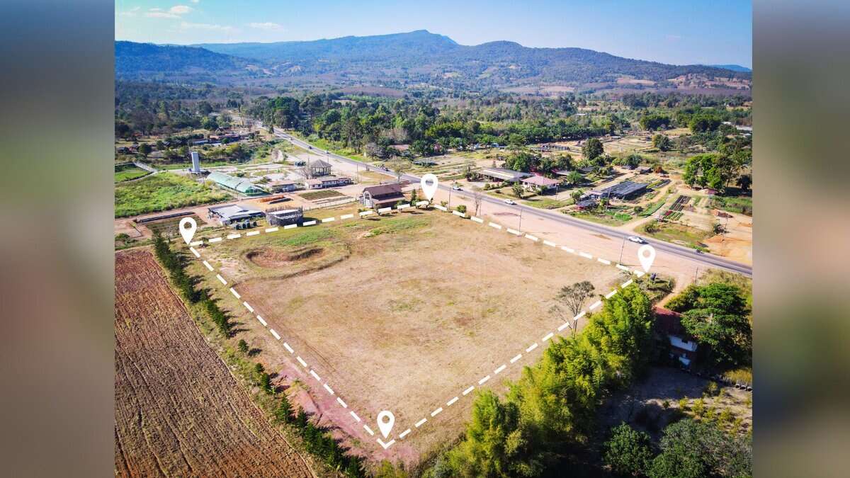 The image shows a patch of land surrounded by hills