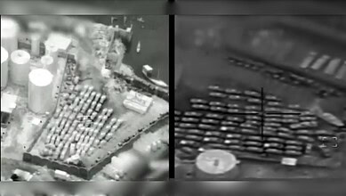 Aerial footage showing rows of weapons and military vehicles at Mukalla port in Yemen.