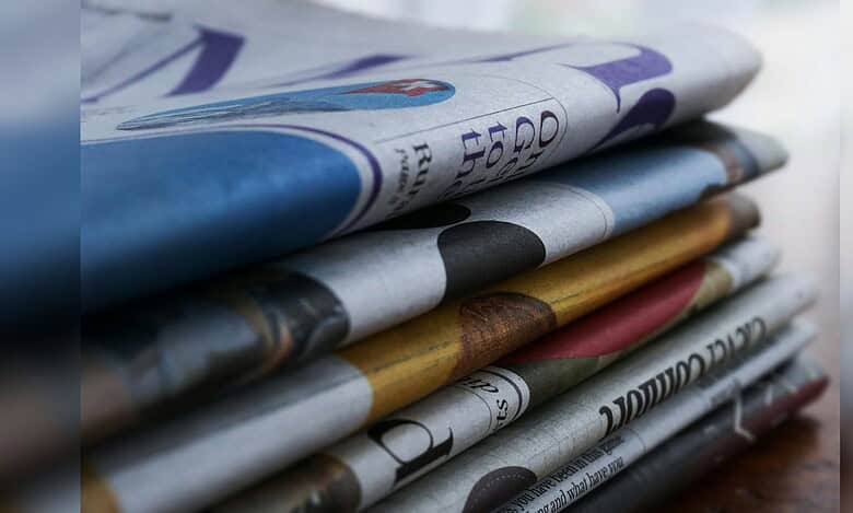 Image showing stacked newspapers