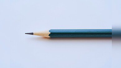 image showing a blue pencil on a gray background