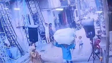 Screenshot from a video showing loudspeakers falling on a three-year-old child.