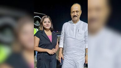 Ajit Pawar with flight attendant Pinky Mali