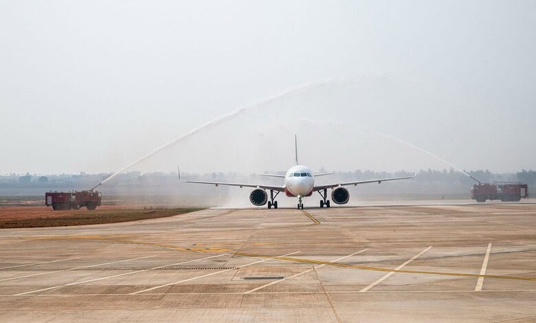 Air India flight welcomes with water cannons at the Bhogapuram International Airport
