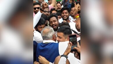 Chaitanya Baghel being greeted by his father, former Chhattisgarh chief minister and Congress leader Bhupesh Baghel, following his release from Raipur jail after the Chhattisgarh High Court granted him bail in two cases linked to the alleged liquor scam in the state, in Raipur, Saturday, Jan. 3, 2026. (PTI Photo)